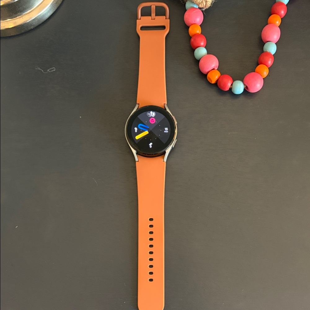 Samsung Galaxy Watch with Orange Silicone Strap